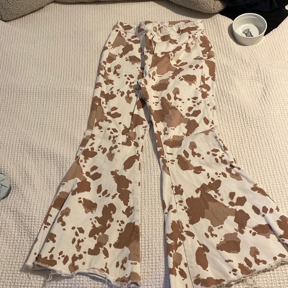 Cow print bell bottom pants